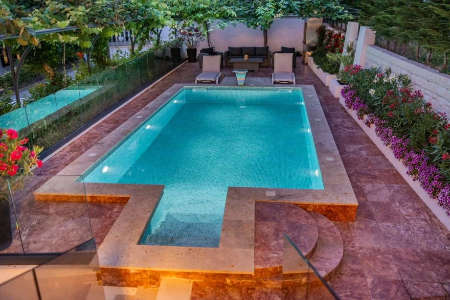 Spacious villa with outdoor pool and shaded lounge area in Montenegro