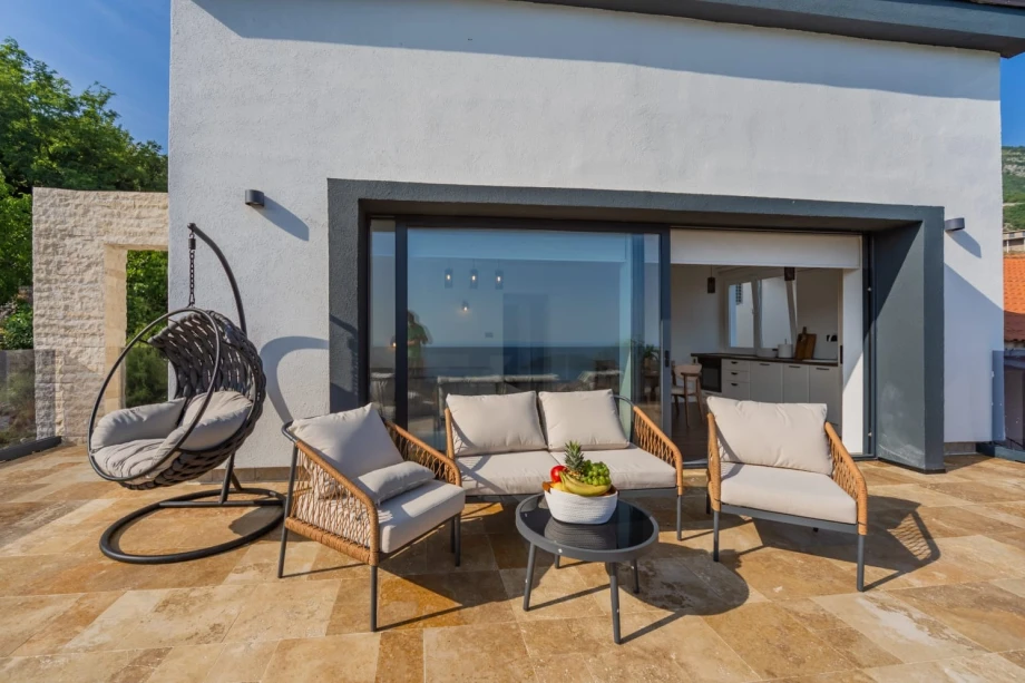 Charming terrace for enjoying outdoor meals and views at a Montenegro villa