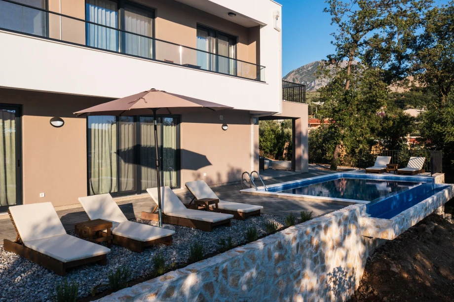Sunbeds by the Poolside Terrace – Montenegro Villa Outdoor Relaxation