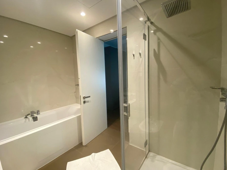 Modern Shower Area with Glass Enclosure – Seasky Residence