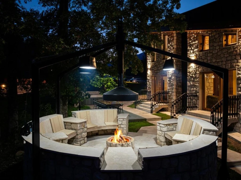 Enjoying by the Fire in the Outdoor Lounge