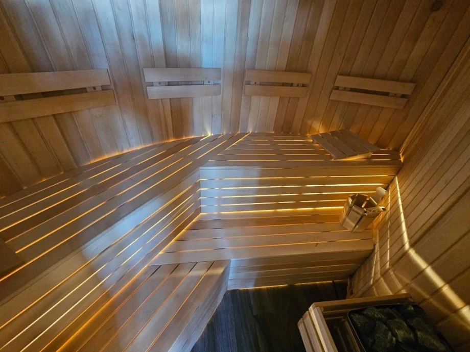 Cozy Sauna with Warm Wooden Interior