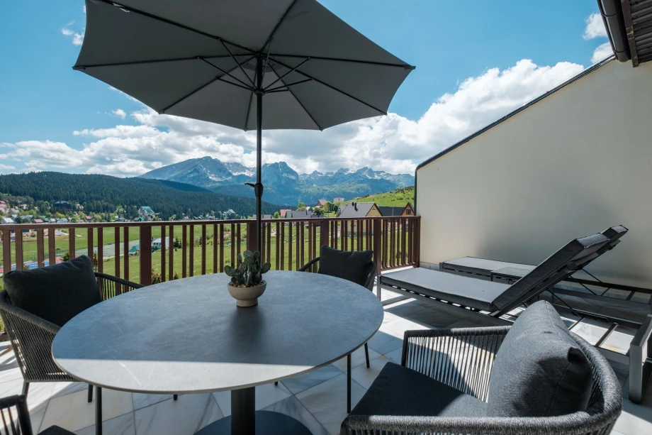 Outdoor Entertainment Corner with Comfortable Seating and Scenic Views in Montenegro Villa