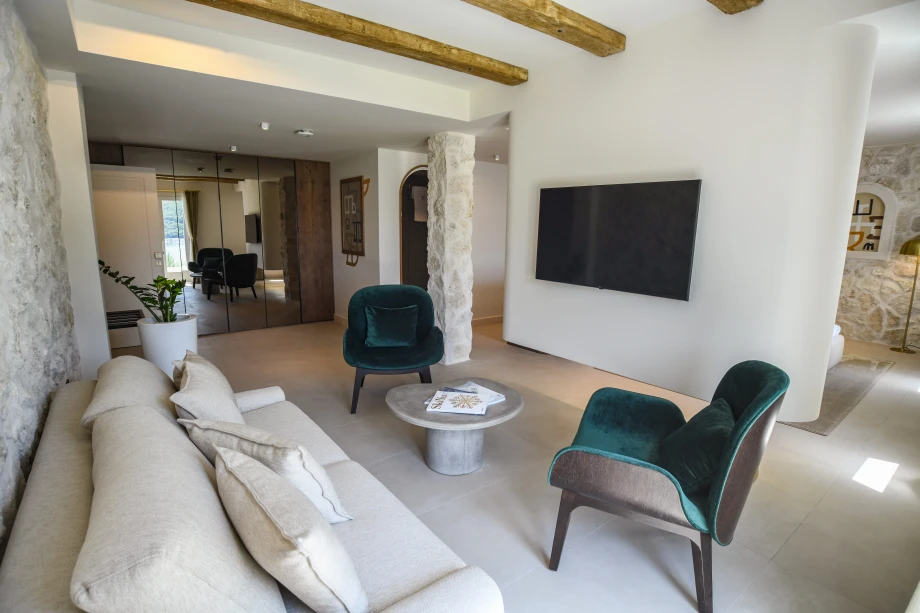 Modern Villa Bedroom with Smart TV and Cozy Design