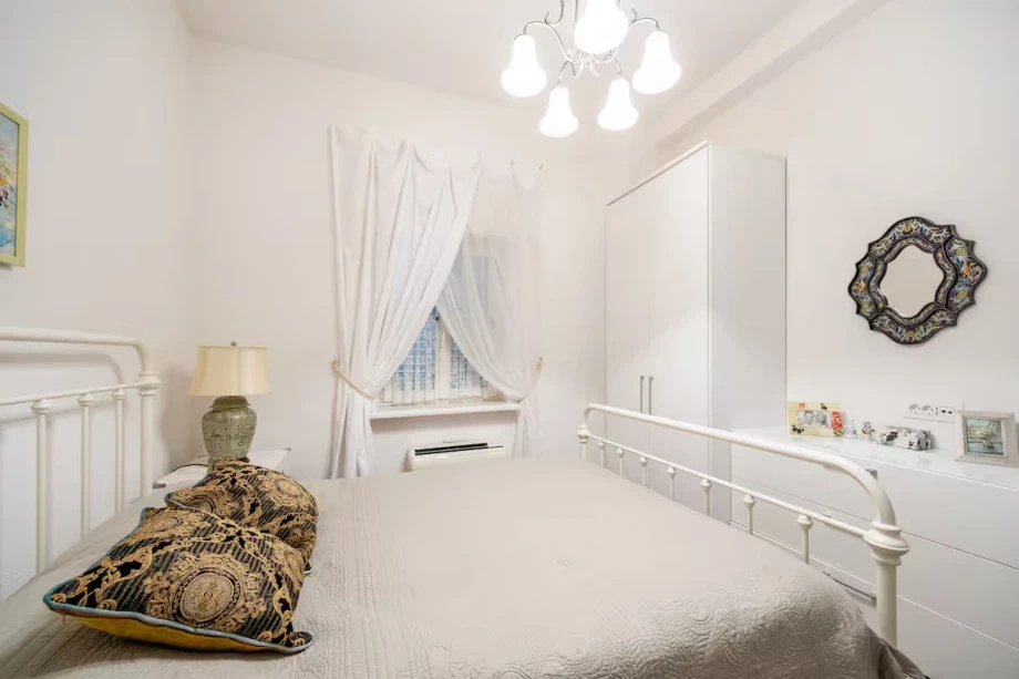 Villa Bedroom Featuring a Luxurious King Bed and Elegant Interiors