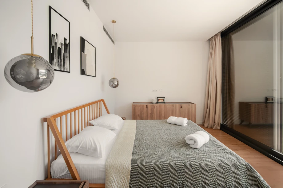 Villa bedroom with king bed and ambient lighting