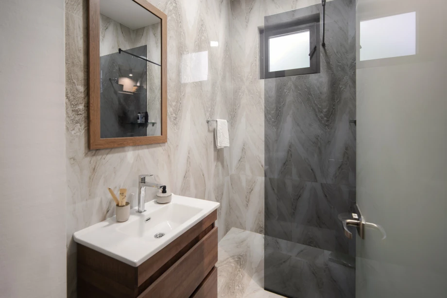 Villa bathroom with modern bath cabin