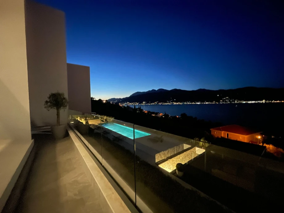 Evening View of Swimming Pool with Lights at Luxury Villa