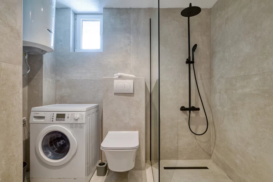 Bathroom with Convenient Laundry Facilities
