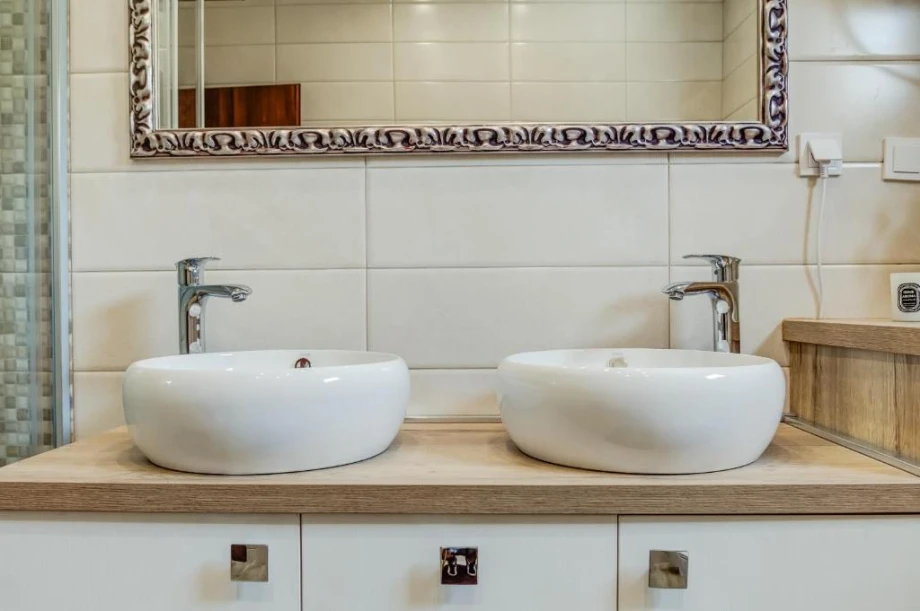 Bathroom Detail – Dual Sinks & Decorative Mirror
