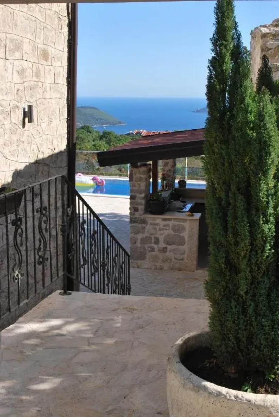 Outdoor stairway leading to villa pool