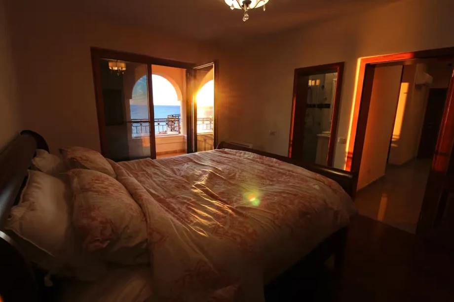 Sunlit Master Bedroom with Soft Neutral Interior Design