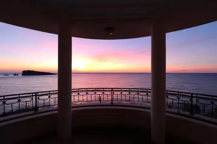 Sunset Balcony Scene with Coastal Twilight Sky