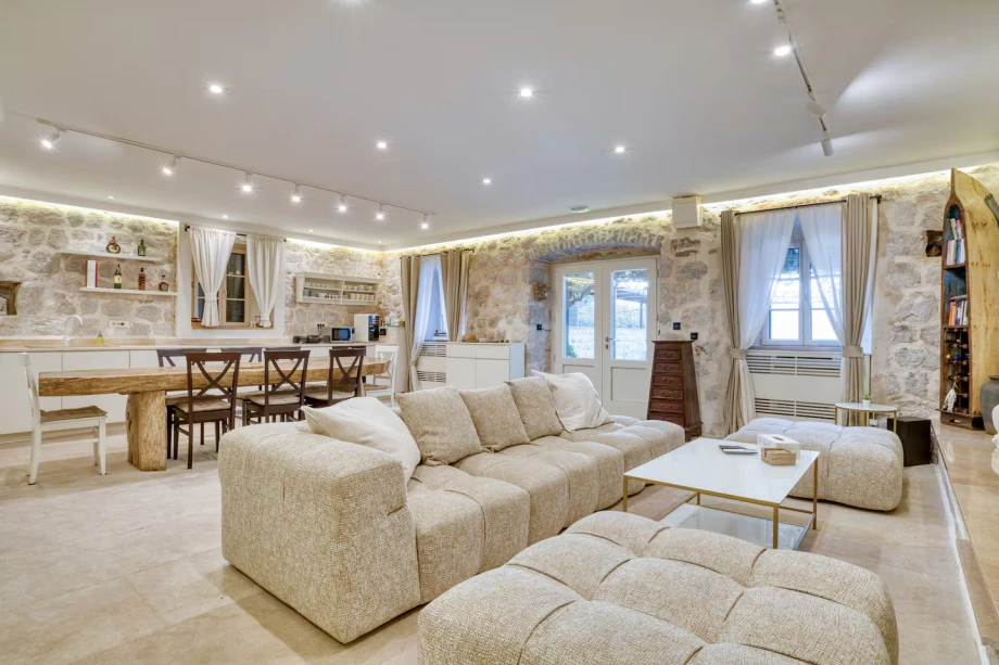 Contemporary living room and dining zone with Mediterranean design at Villa Riviera Privata