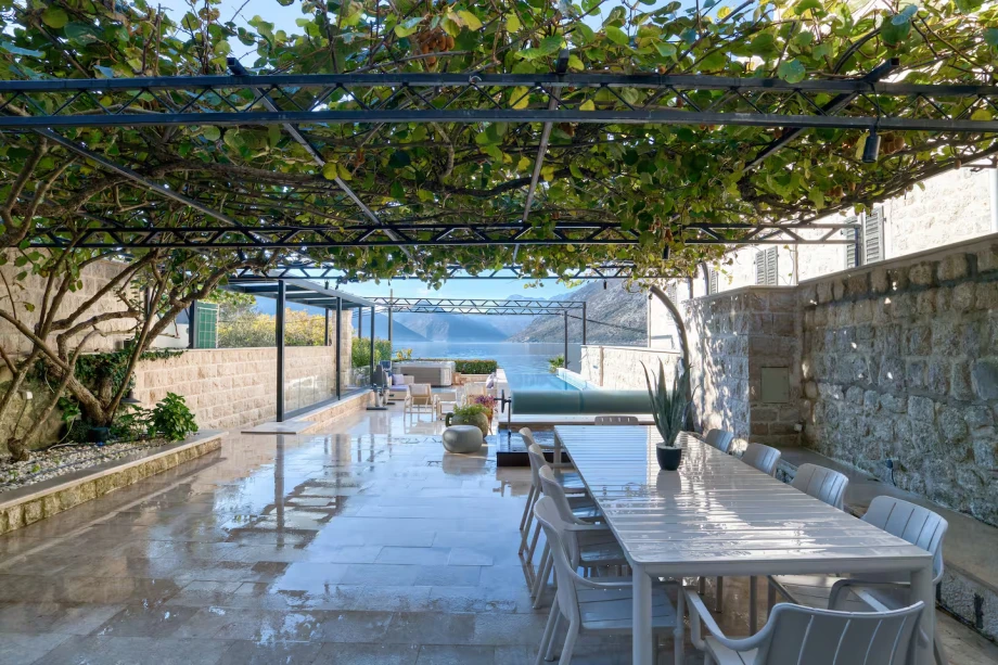 Poolside terrace with Adriatic water vista at Villa Riviera Privata