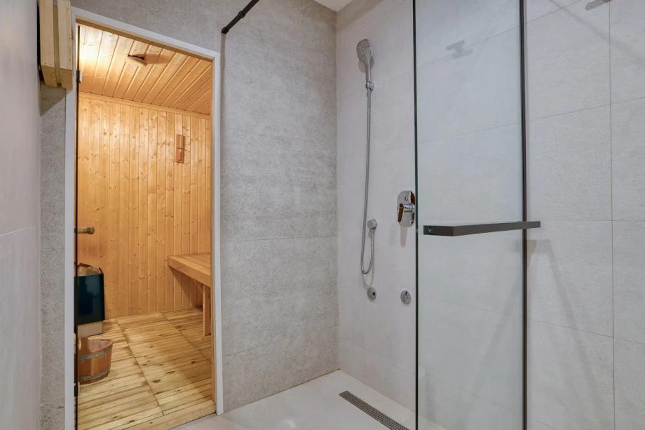 Villa Riviera Privata — Bathroom Shower Area with Private Sauna Entrance