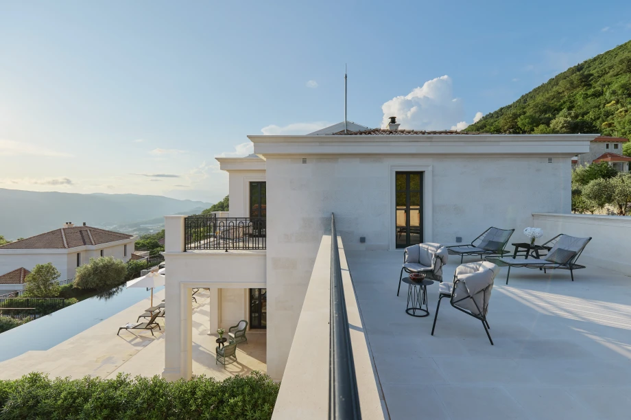Villa Gran Palacio Outdoor Lounge Area with Sunbeds and Garden Views