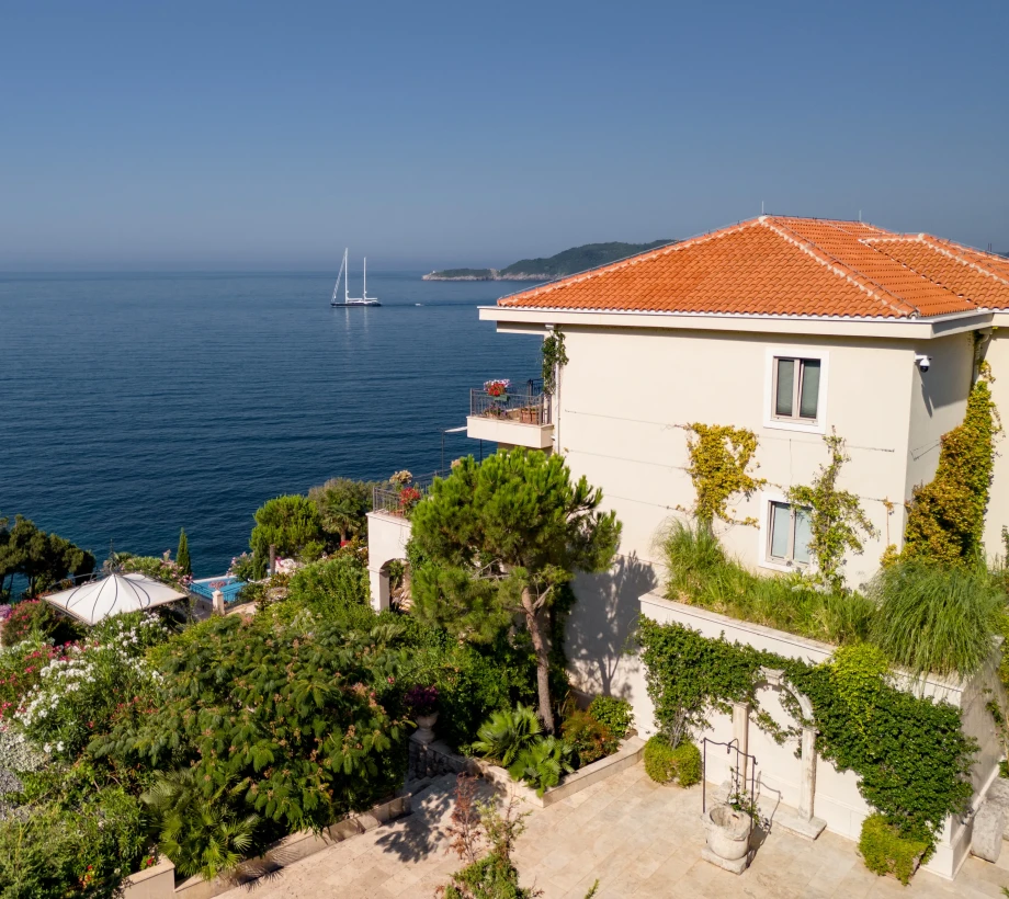 Exterior view of Villa Cliffside Royal Estate perched above the Adriatic coast