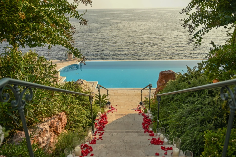 Staircase view over infinity pool at Villa Cliffside Royal Estate
