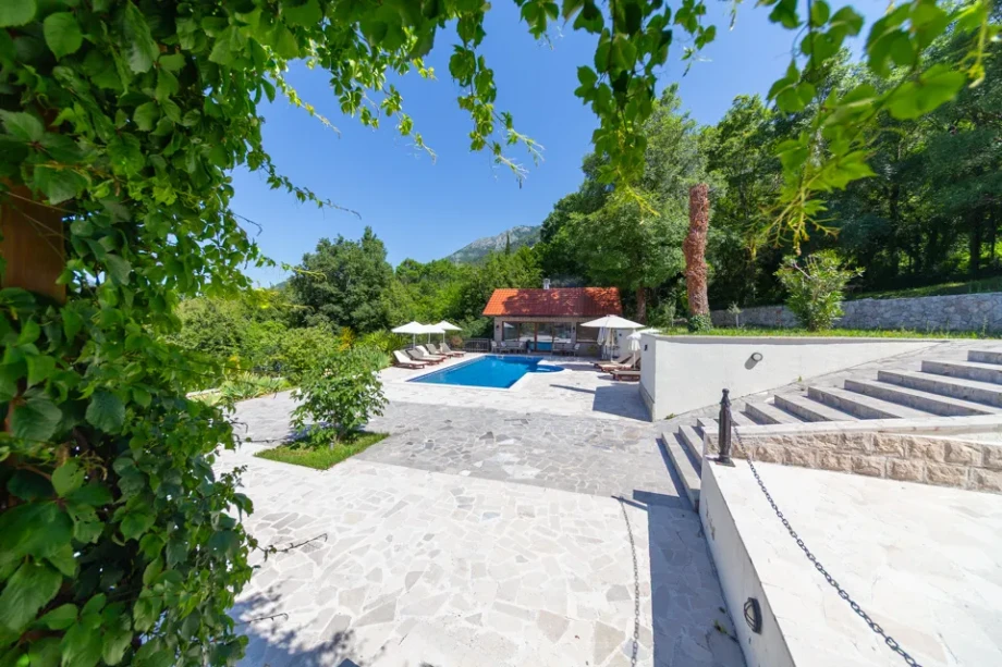 Swimming Pool Area at Villa Gardenia 1 with Sun Loungers and Outdoor Relaxation Space