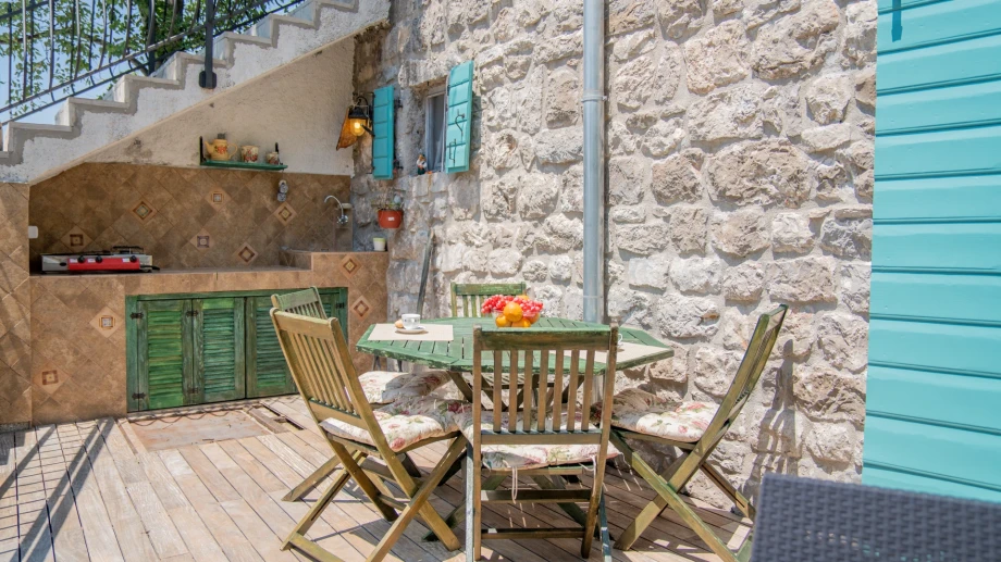 Outdoor Dining Table Setting on Luxury Villa Terrace