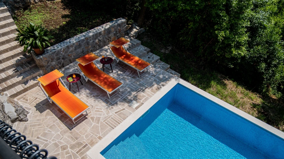 Comfortable Sun Loungers Beside the Private Pool