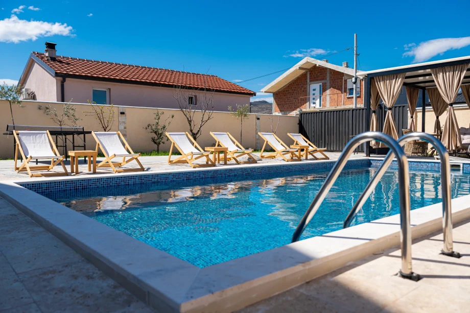 Pool with Sun Loungers at Villa Armonia in a Refined Outdoor Retreat