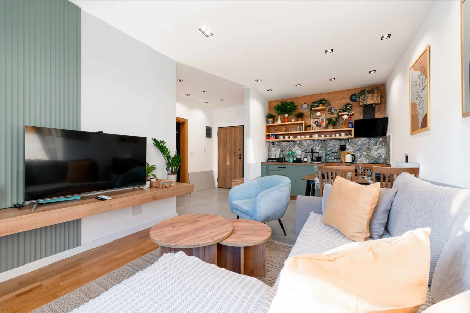 Open Living Room and Kitchen Area at Azure Echo Retreat