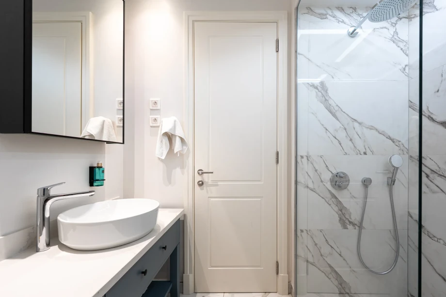 Modern Walk-In Shower at Coastal Elegance Residences