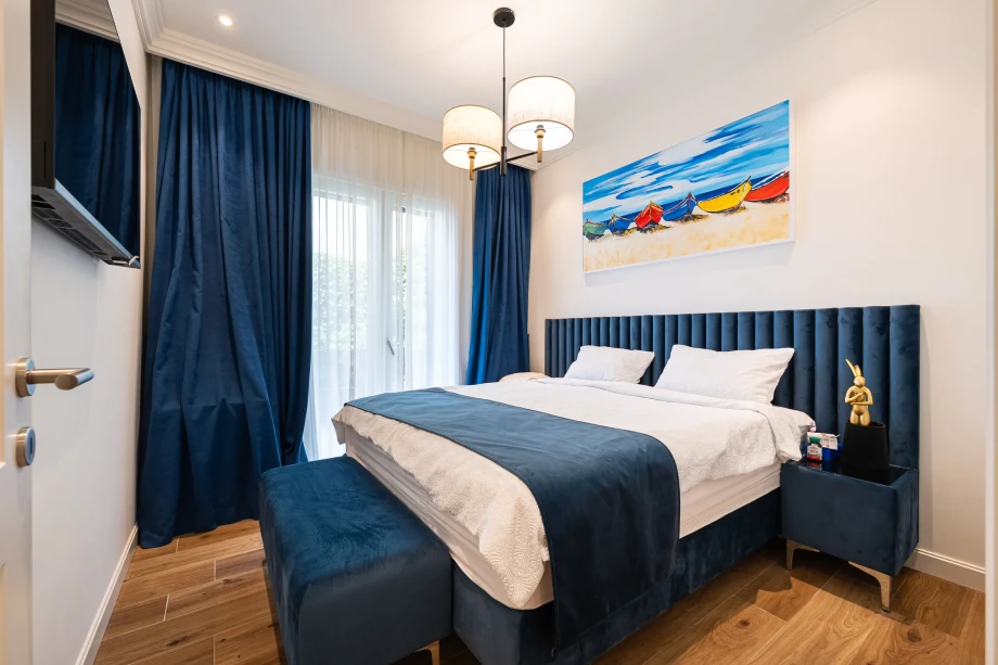 King Size Bed in Coastal Elegance Residence Master Bedroom