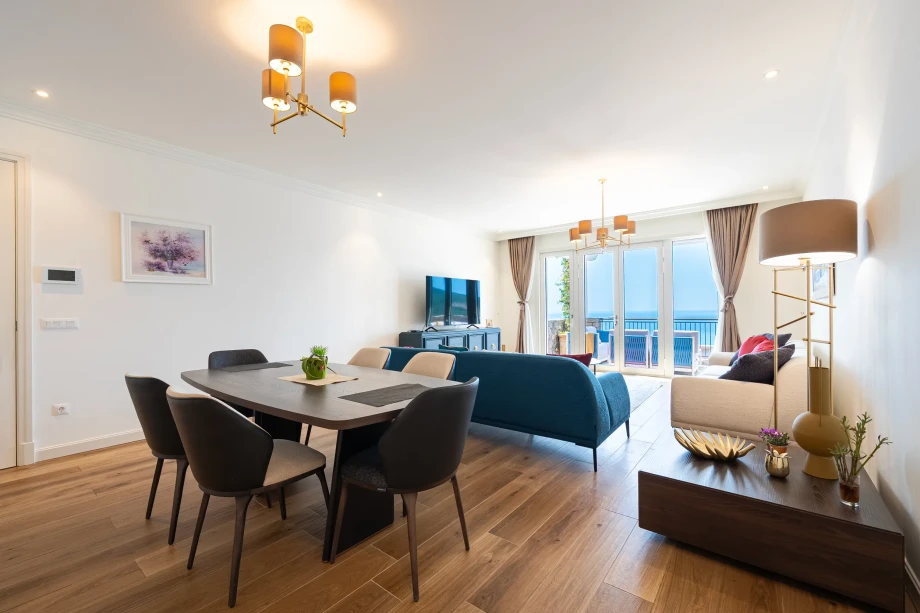 Open-Concept Living and Dining Area at Coastal Elegance Residence
