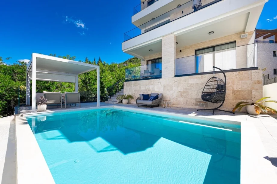 Sunlit Pool Deck and Outdoor Leisure Area