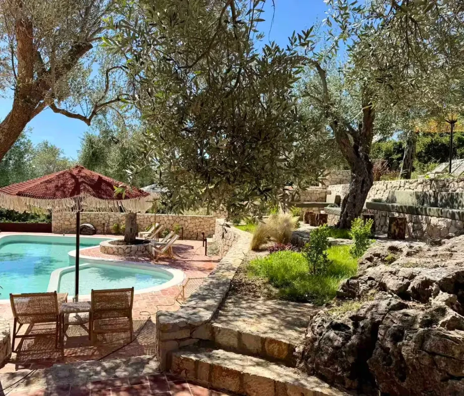 Outdoor Leisure Area by the Pool at Villa Rametto