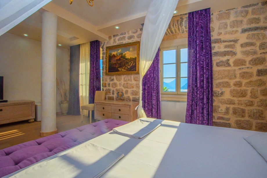 Sunlit Bedroom with Neatly Made Bed | Stone House Seafront Villa