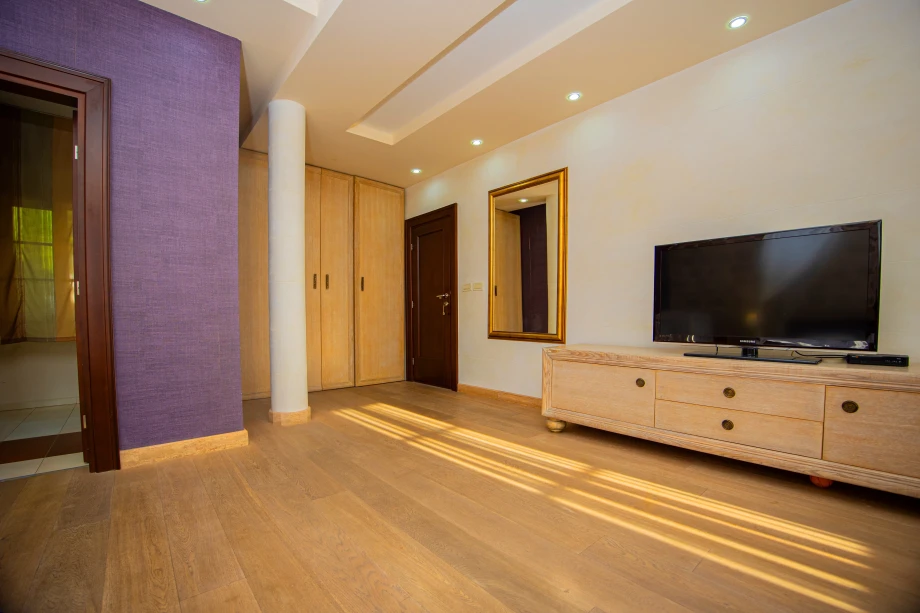 Spacious TV Lounge Area | Stone House Seafront Villa