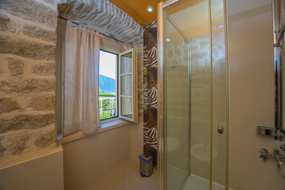 Elegant Bathroom with Walk-In Shower | Stone House Seafront Villa