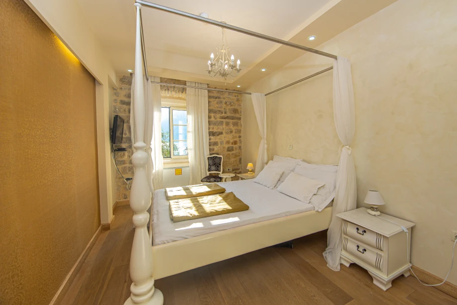 Cozy Bedroom with Window | Stone House Seafront Villa
