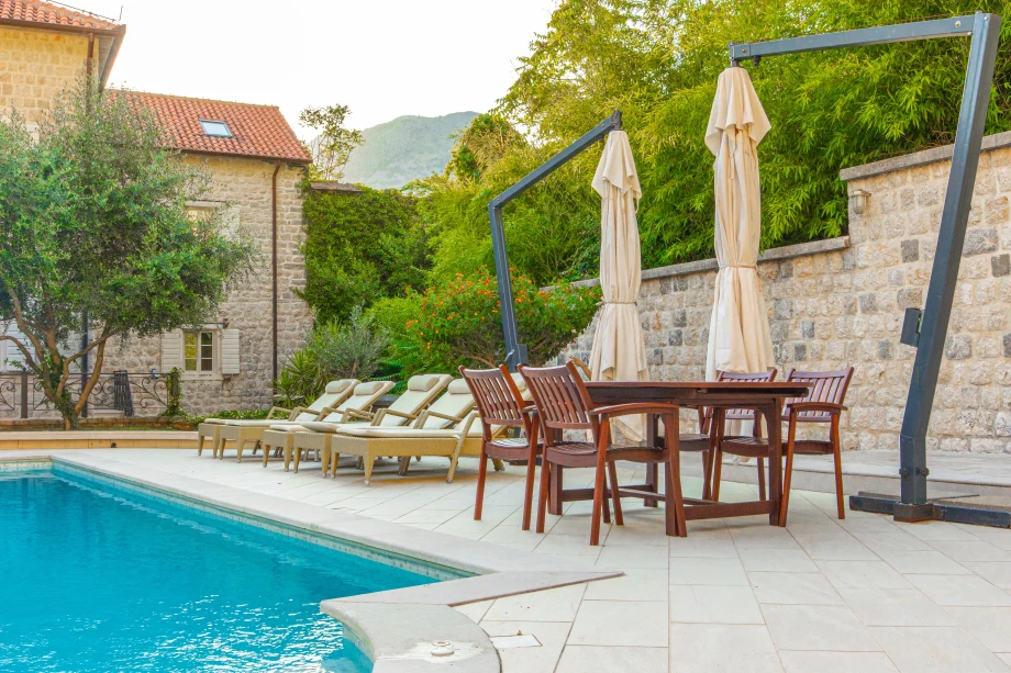 Poolside Seating Area | Stone House Seafront Villa