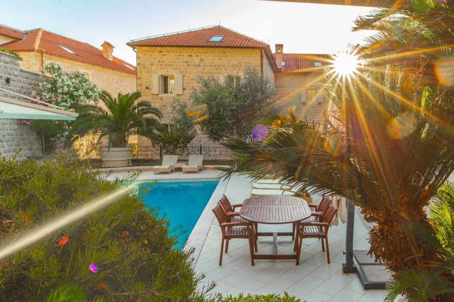 Sunset over Stone House Seafront Villa