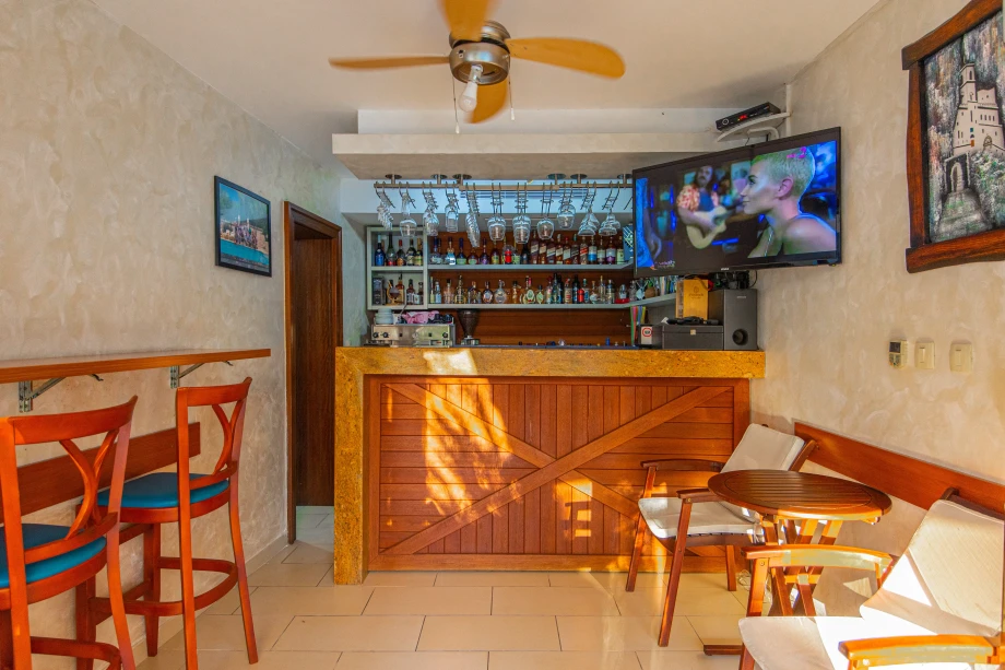 Poolside Bar & Outdoor Seating | Stone House Seafront Villa
