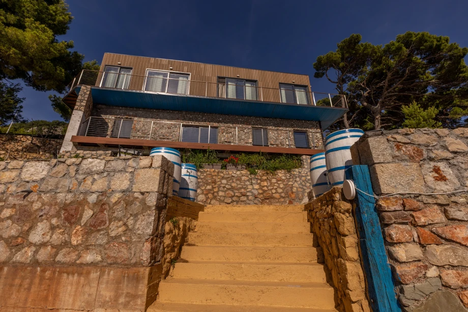 Villa Exterior with Private Beach | Canvas Coast